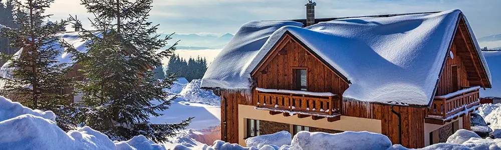 chalet in the middle of snow 